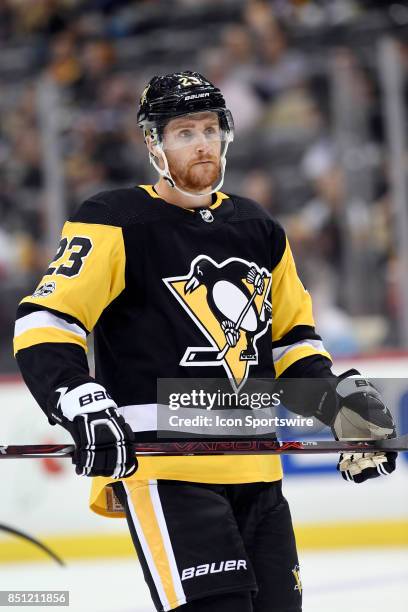 Pittsburgh Penguins Left Wing Scott Wilson looks on during the third period in the NHL preseason game between the Pittsburgh Penguins and the Detroit...