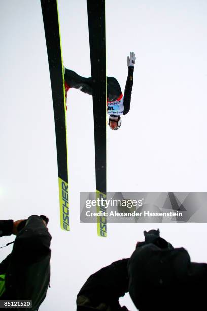 Petter Tande of Norway jumps over photographers during the Ski Jumping 134M Hill Trial Round of the Nordic Combined Team Gundersen at the FIS Nordic...