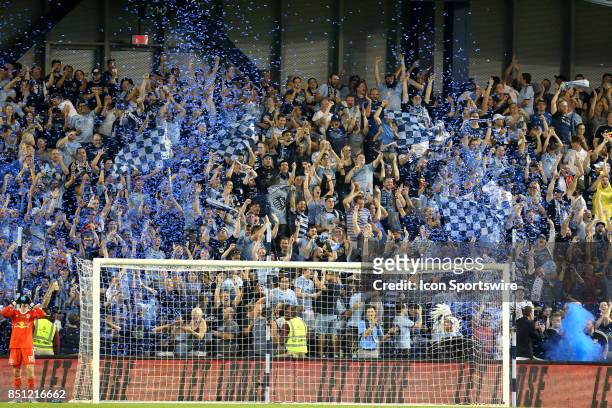 Confetti canons explode after a Sporting KC goal in the first half of the Lamar Hunt US Open Cup final between the New York Red Bulls and Sporting...