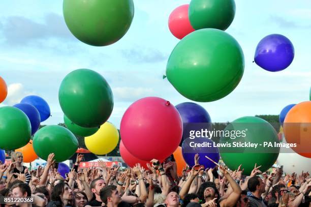 The crowd are treated to giant balloons as part of the 30 Seconds to Mars performance on day three of the Download Festival at Castle Donington.