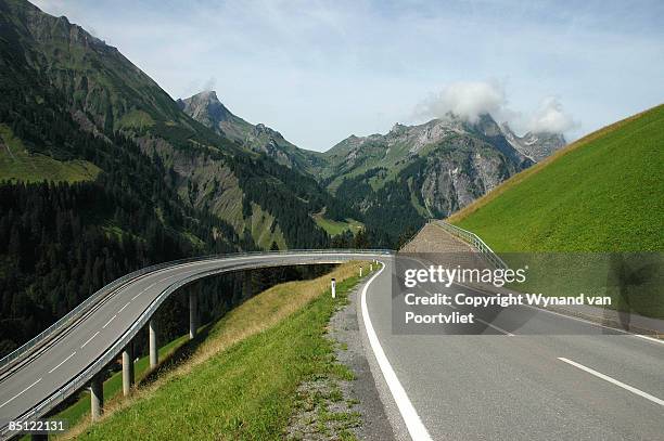 mountain road - hairpin curve stock pictures, royalty-free photos & images