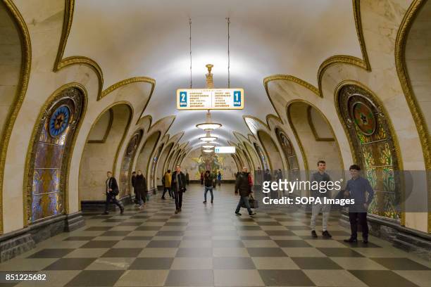 Commuters make their way to the platforms at Moscow's Novoslobodskaya Metro Station.