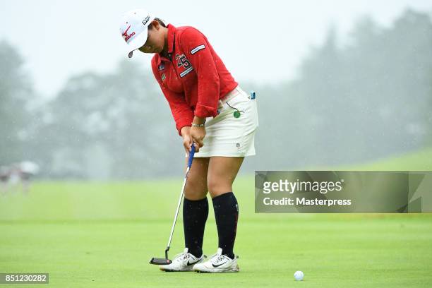 Hikaru Yoshimoto of Japan putts during the final round of the Chugoku Shimbun Choopi Ladies Cup at the Geinan Country Club on September 22, 2017 in...