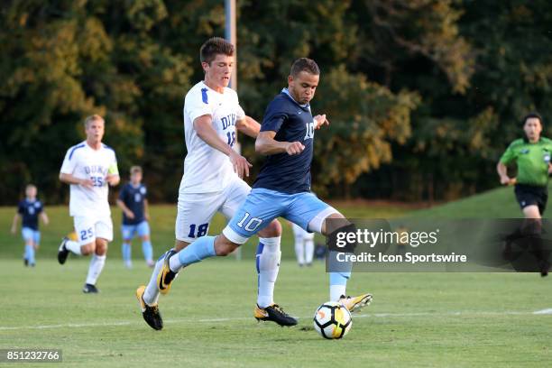 North Carolina's Zach Wright and Duke's Mattias Frick during the North Carolina Tar Heels game versus the Duke Blue Devils on September 16 at...