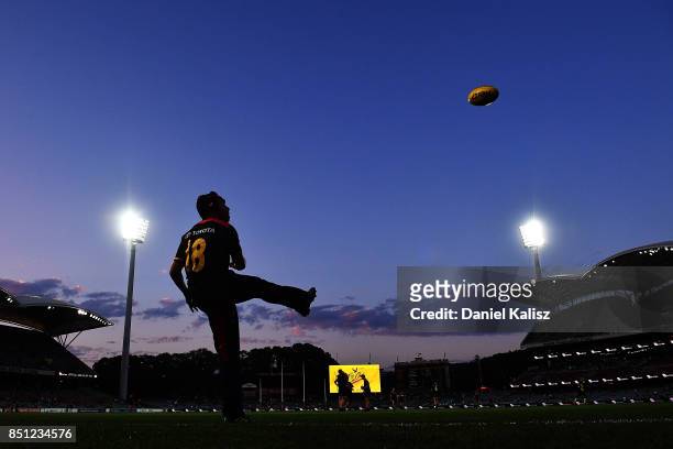 Eddie Betts of the Crows warms up kicking for goal prior to the First AFL Preliminary Final match between the Adelaide Crows and the Geelong Cats at...