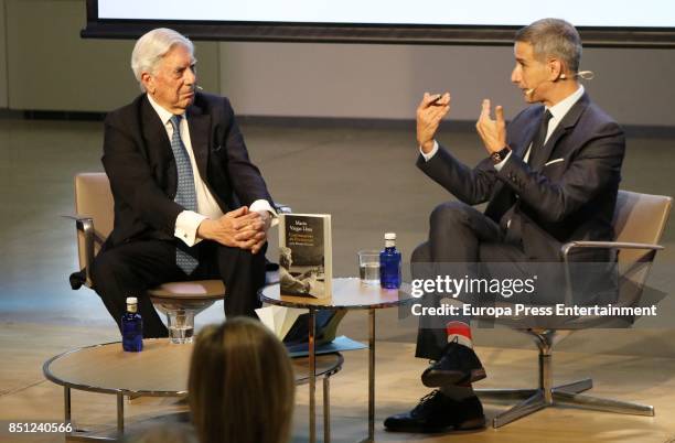 Mario Vargas Llosa and Ruben Gallo attend a conference about Vargas Llosa's last book 'Conversacion en Princeton' on September 21, 2017 in Madrid,...