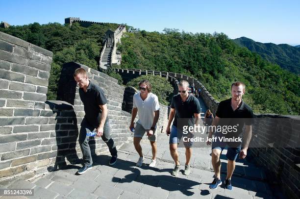 Daniel Sedin, Loui Eriksson, Alexander Edler and Henrik Sedin of the Vancouver Canucks climb the Great Wall of China September 22, 2017 in Beijing,...