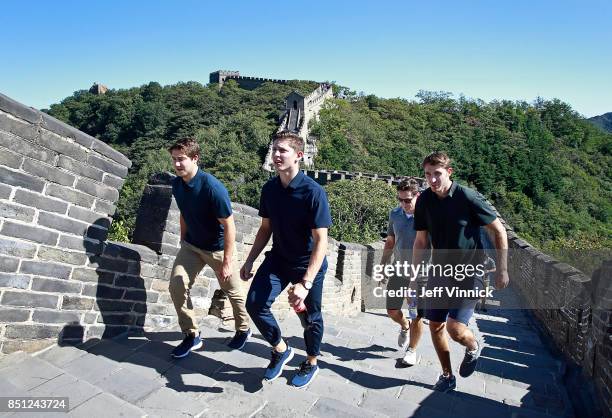 Reid Boucher, Troy Stecher, Scotty Upshall and Patrick Wiercioch of the Vancouver Canucks climb the Great Wall of China September 22, 2017 in...