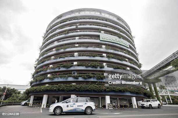 Charging parking lot tower stands at the BYD Co. Headquarters in Shenzhen, China, on Thursday, Sept. 21, 2017. China will likely order an end to...