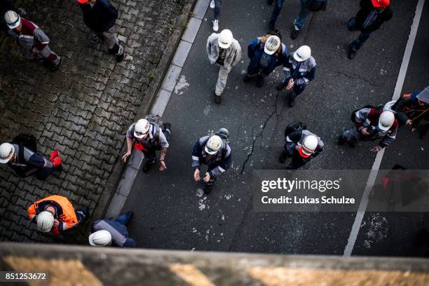 Workers from German steelmaker ThyssenKrupp protest against the recently announced fusion of ThyssenKrupp with steelmaker Tata Steel on September 22,...