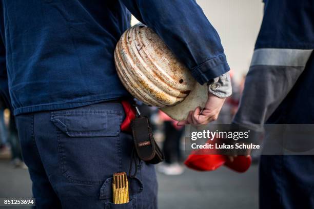 Workers from German steelmaker ThyssenKrupp protest against the recently announced fusion of ThyssenKrupp with steelmaker Tata Steel on September 22,...