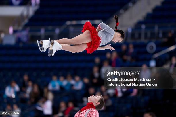 Apollinariia Panfilova and Dmitry Rylov of Russia compete in the Junior Pairs Short Program during day two of the ISU Junior Grand Prix of Figure...