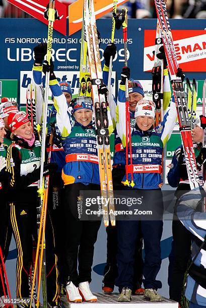Pirjo Muranen, Virpi kuitunen, Riitta-liisa Roponen and Aino Kaisa Saarinen of Finland take 1st place, during the FIS Nordic World Ski Championships...