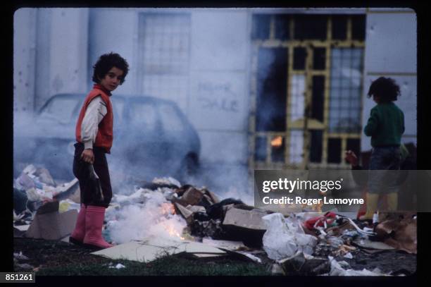 Children scavenge through garbage December 1, 1994 in Sarajevo, Bosnia-Herzegovina. When Bosnia declared its independence in March of 1992, the...