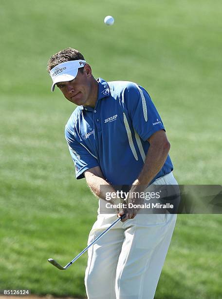 Lee Westwood of England plays a shot on the fourth hole during the second round of the Accenture Match Play Championship at the Ritz-Carlton Golf...