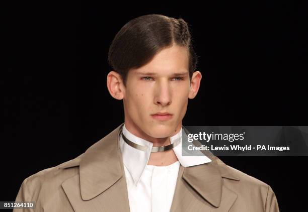 Model on the catwalk at The Xander Zhou show at the London Collections: MEN SS14 in London.