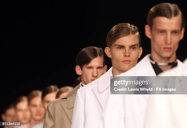 Models on the catwalk at The Xander Zhou show at the London Collections: MEN SS14 in London.