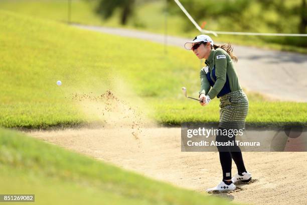 Akane Iijima of Japan hits from a bunker on the 8th hole during the first round of the Miyagi TV Cup Dunlop Ladies Open 2017 at the Rifu Golf Club on...