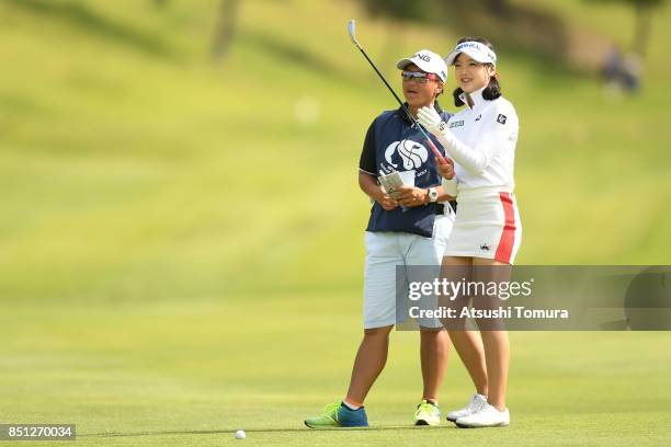 Yuting Seki of China lines up her second shot on the 8th hole during the first round of the Miyagi TV Cup Dunlop Ladies Open 2017 at the Rifu Golf...