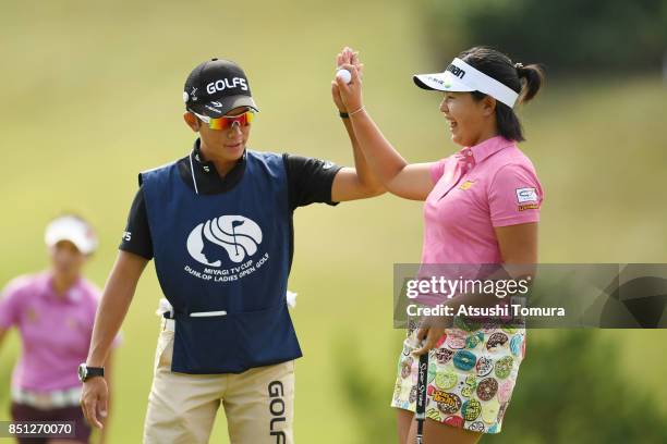 Shoko Sasaki of Japan celebrates after making her eagle putt on the 8th hole during the first round of the Miyagi TV Cup Dunlop Ladies Open 2017 at...