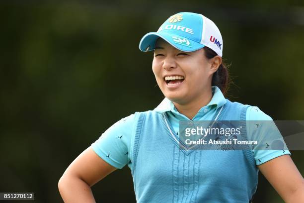 Saki Nagamine of Japan smiles during the first round of the Miyagi TV Cup Dunlop Ladies Open 2017 at the Rifu Golf Club on September 22, 2017 in...