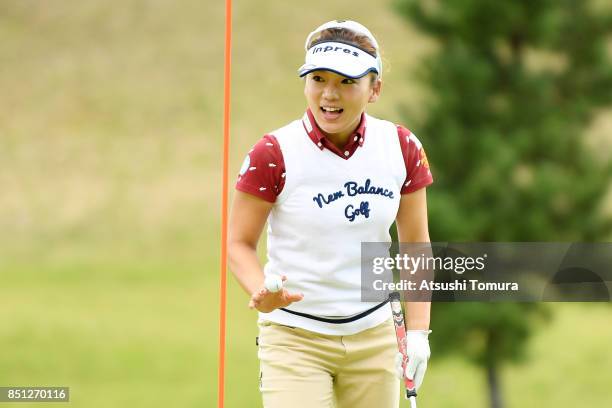 Chie Arimura of Japan celebrates after chipping in her second shot on the 17th hole during the first round of the Miyagi TV Cup Dunlop Ladies Open...