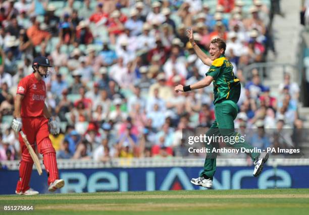 England's Alastair Cook reacts after being caught behind off the bowling of South Africa's Chris Morris for 6 during the ICC Champions Trophy, Semi...