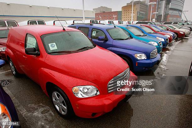 Cars and trucks are offered for sale at a Chevrolet dealership February 26, 2009 in Park Ridge, Illinois. General Motors Corp., the maker of...