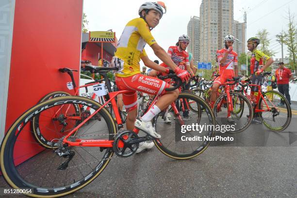 The Yellow Jersey, Kevin Rivera Serrano from Androni Sidermec Bottecchia team, awaits for the start to the fourth stage of the 2017 Tour of China 2,...