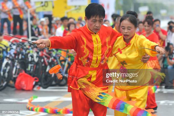 Demonstration of traditional dances and other activities ahead of the start to the fourth stage of the 2017 Tour of China 2, the 115.3km Huangshi...