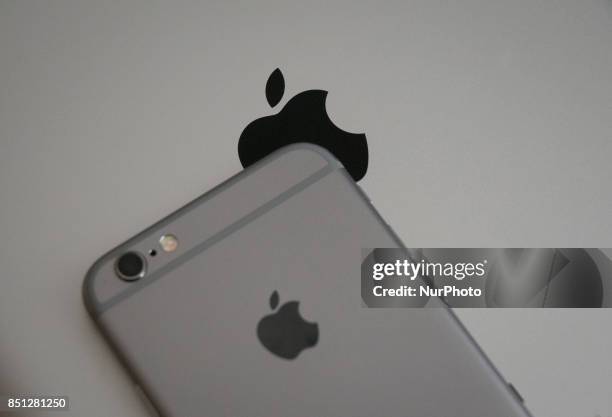 The rear of an iPhone 6s is seen with a first generation iPad in this photo illustration on September 22, 2017.