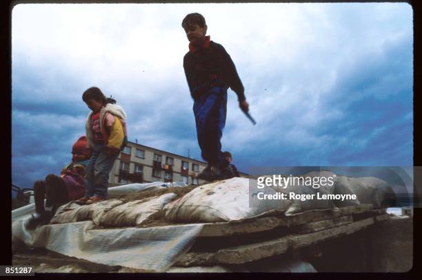 Children play war games December 1, 1994 in Sarajevo, Bosnia-Herzegovina. When Bosnia declared its independence in March of 1992, the Bosnian Serbs...