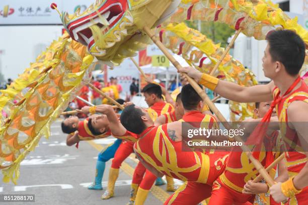 Demonstration of traditional dances and other activities ahead of the start to the fourth stage of the 2017 Tour of China 2, the 115.3km Huangshi...