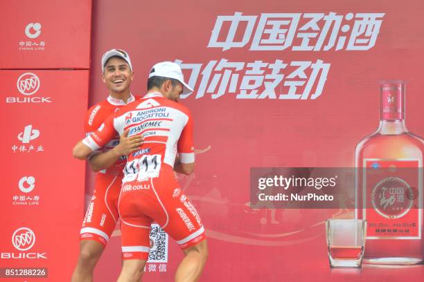 Matteo Malucelli and Marco Benfatto , during the Awards Ceremony of the fourth stage of the 2017 Tour of China 2, the 115.3km Huangshi Daye Circuit...