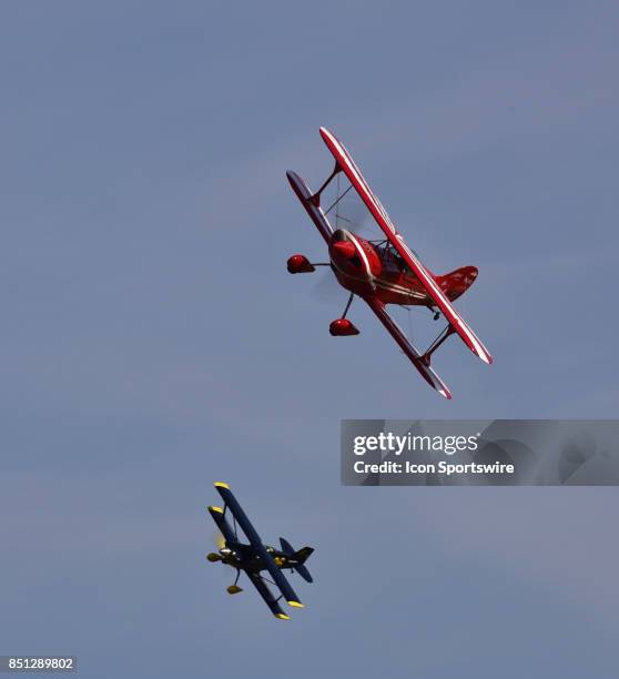 Biplanes bank around the pylon in the Silver class race at the 54th National Championship Air Races the only closed course pylon racing event in the...