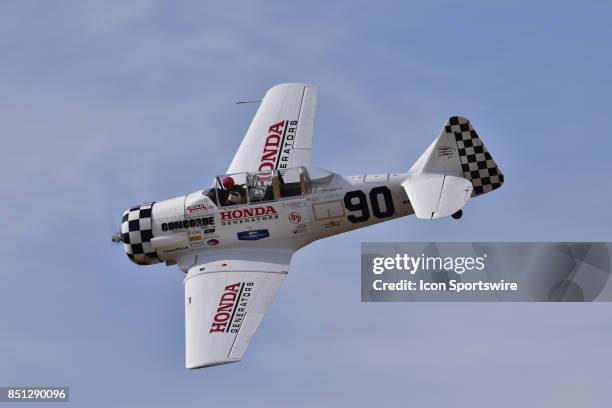 Greg McNeely pilot of the T-6G "Undecided" places 4th in the T-6 Heat 2A race at the 54th National Championship Air Races the only closed course...