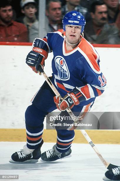 Mark Messier of the Edmonton Oilers skates against the Boston Bruins at Boston Garden.