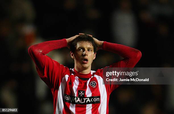 Greg Halford of Sheffield United looks dejected during the FA Cup sponsored by E.on, 5th round replay match between Hull City and Sheffield United at...