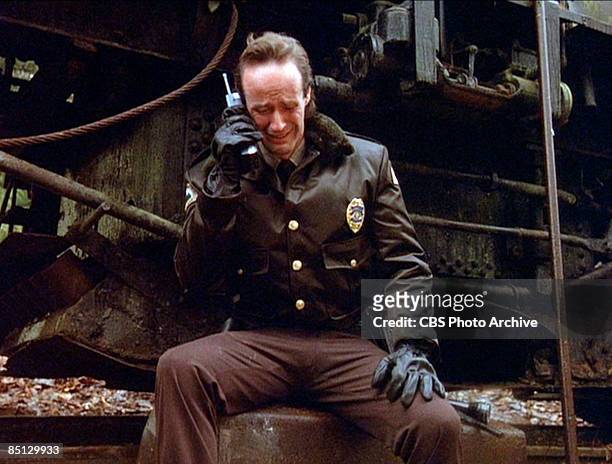 Harry Goaz as Deputy Andy Brennan expresses distress while speaking into a telephone, from the pilot episode screen grab of the hit television show...