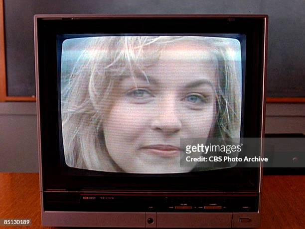 Murdered homecoming queen Laura Palmer, played by Sheryl Lee, appears in a video in the pilot episode screen grab of the hit television show 'Twin...