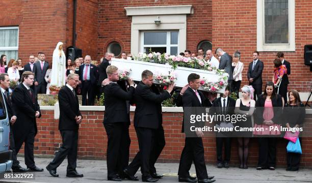 The coffin of Beth Jones, who died in a crash on the M62 as she headed to a hen party, is carried into St Joseph's church in South Elmsall.