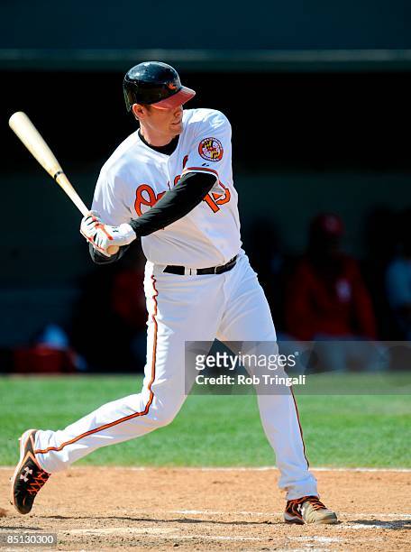 Matt Wieters of the Baltimore Orioles bats against the St Louis Cardinals during a spring training game at Fort Lauderdale Stadium on February 26,...