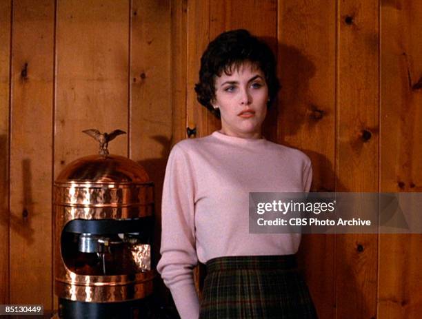 Actress Sherilyn Fenn as Audrey Horne in the pilot episode screen grab of David Lynch's hit television series 'Twin Peaks', 1990.