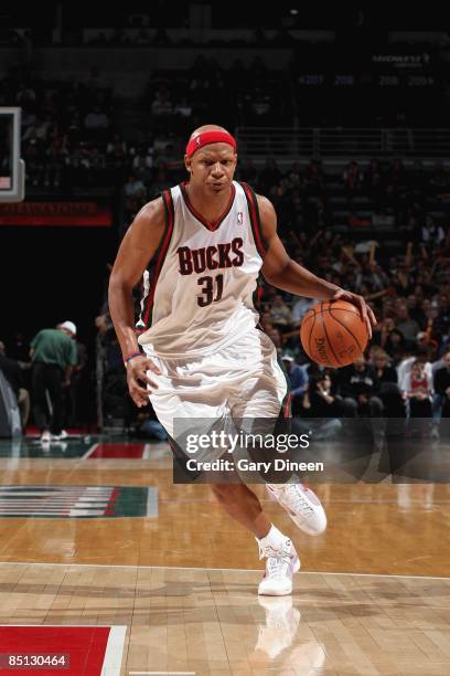 Charlie Villanueva of the Milwaukee Bucks moves the ball up court during the game against of the Cleveland Cavaliers at the Bradley Center on...