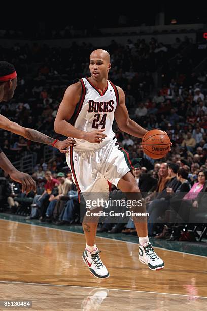Richard Jefferson of the Milwaukee Bucks moves the ball up court during the game against of the Cleveland Cavaliers at the Bradley Center on February...