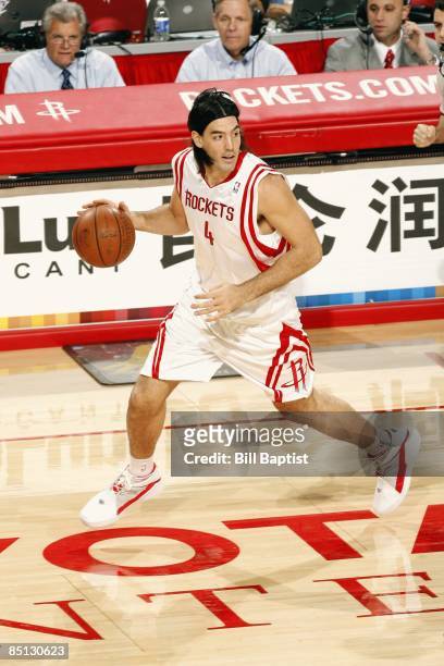Luis Scola of the Houston Rockets moves the ball up court during the game against the Sacramento Kings at Toyota Center on February 11, 2009 in...