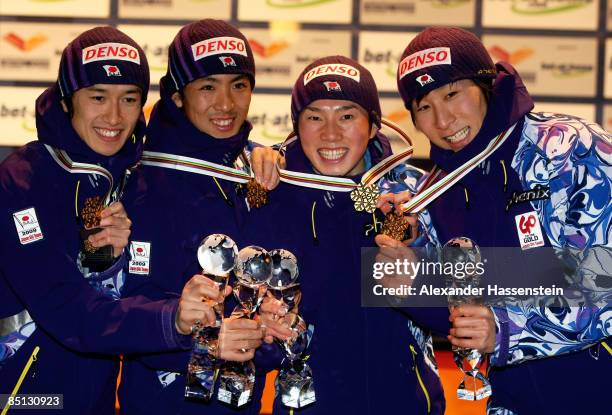 Norihito Kobayashi, Yusuke Minato, Taihei Kato and Akito Watabe of Japan pose with the Gold medals won during the 4X5KM Relay competition of the...