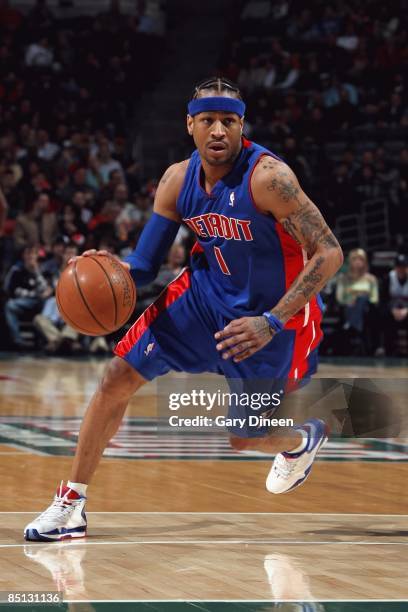 Allen Iverson of the Detroit Pistons moves the ball up court during the game against Milwaukee Bucks at the Bradley Center on February 7, 2009 in...