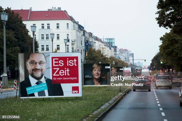 Election posters of chancellor candidate of the Social Democratic Party Martin Schulz and of German Chancellor Angela Merkel are pictured in the...
