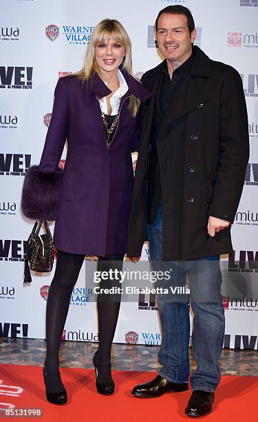 Italian actress Matilde Brandi and husband attend 'Live!' premiere at Warner Cinema Moderno on February 26, 2009 in Rome, Italy.